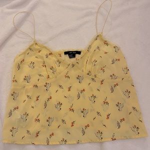 Yellow flowered flowy top, size small.